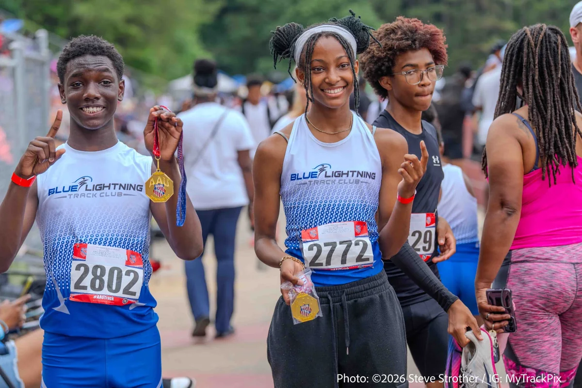 Blue Lightning Champions Jaiden Tennyson and Maurica Calhoun displaying their medals